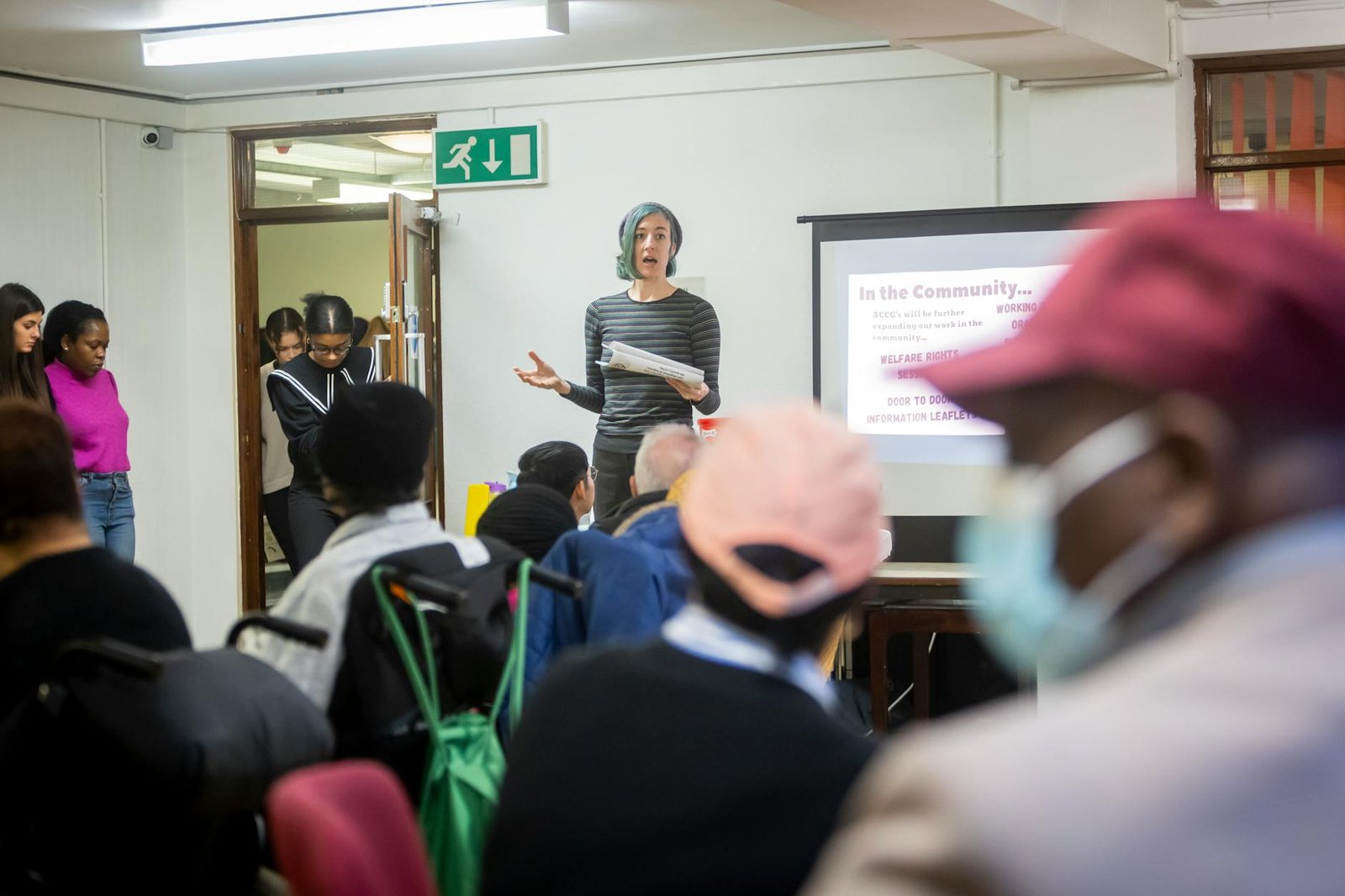Community members attending a digital safety seminar
